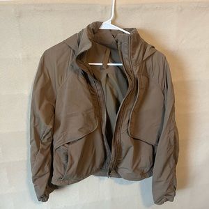Lululemon Always Effortless Jacket in tan/beige color.